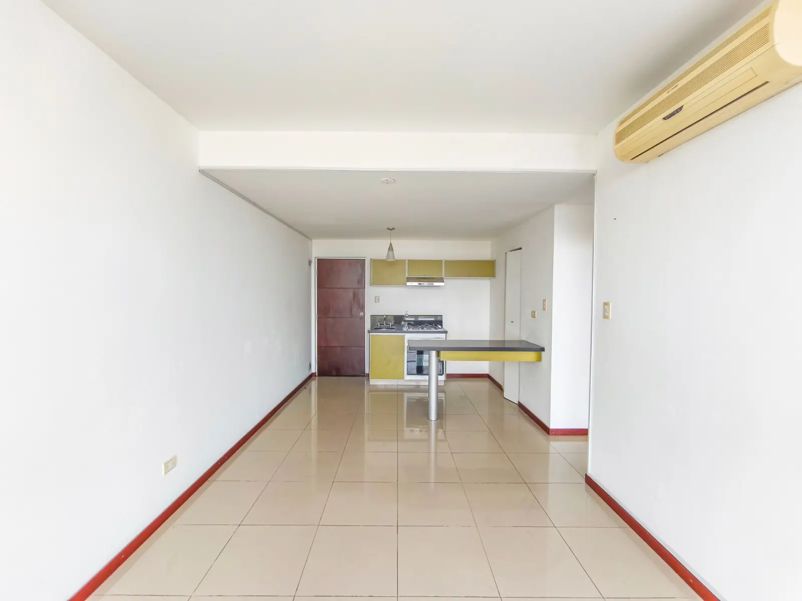 Ambiente abierto con cocina integrada